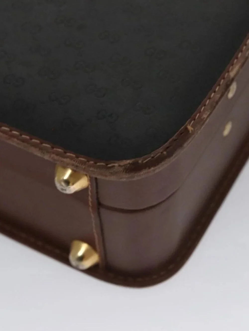 GUCCI Micro GG Canvas Trunk Black Gold